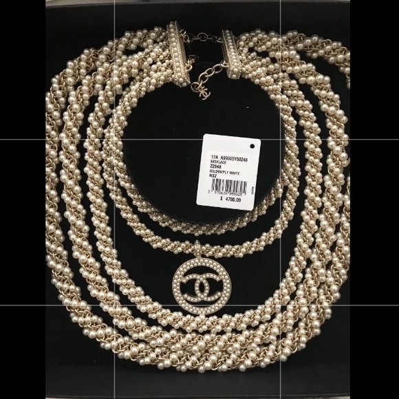 CHANEL Jewelry - Chanel Multi Strand Pearl Necklace CC Pendant.